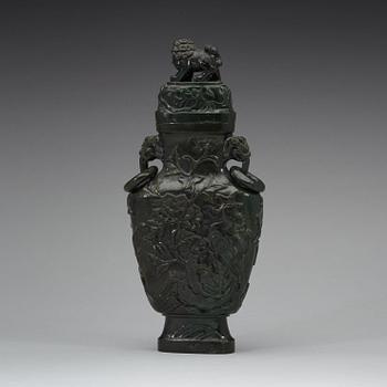 A Chinese carved stone vase, 20th Century.