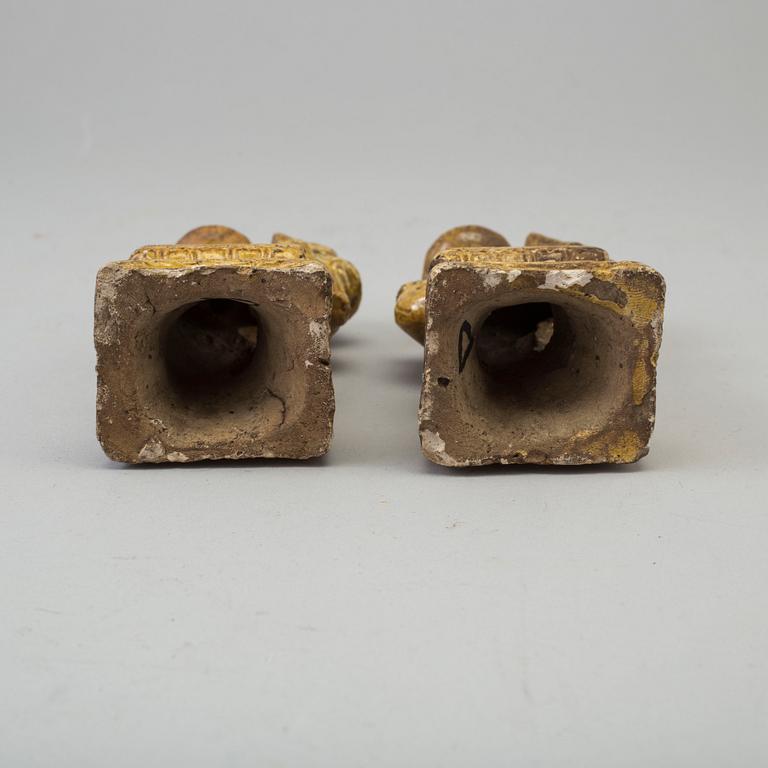 A pair of yellow glazed chinese joss sticks holders, 17th Century.