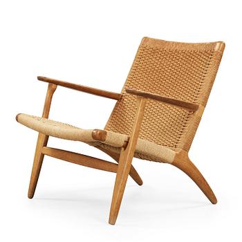 82. A Hans J Wegner 'CH-25' oak easy chair, Carl Hansen & Son, Denmark.