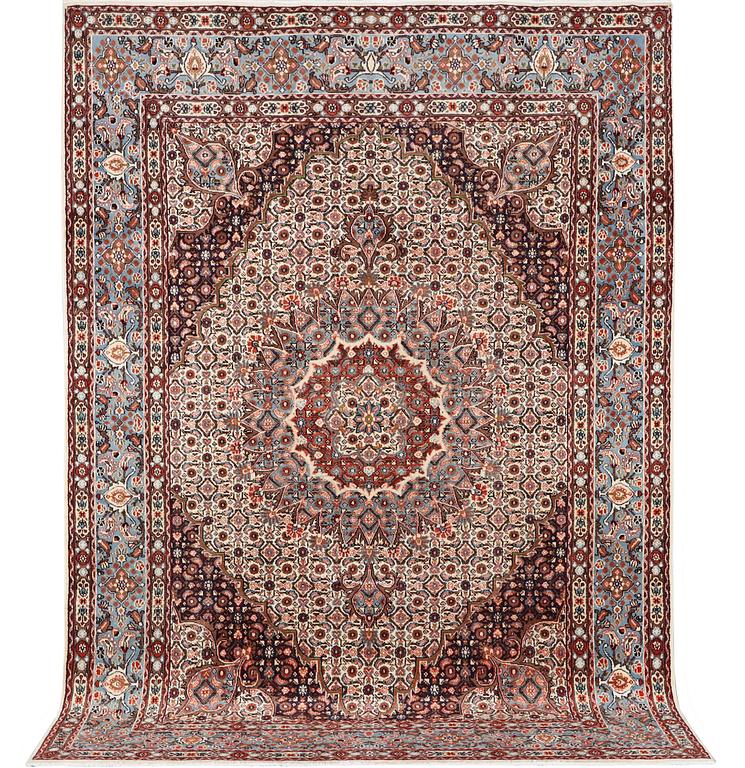 An Oriental carpet, c. 295 x 214 cm.