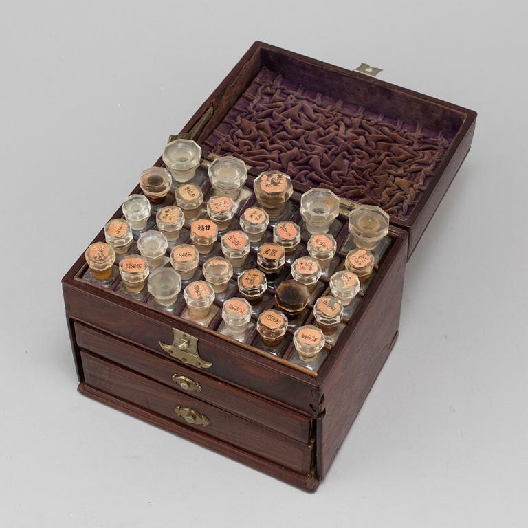 A Japanese apothecary box with flasks, 20th century.