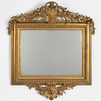 Mirror, rococo style, around the year 1900.