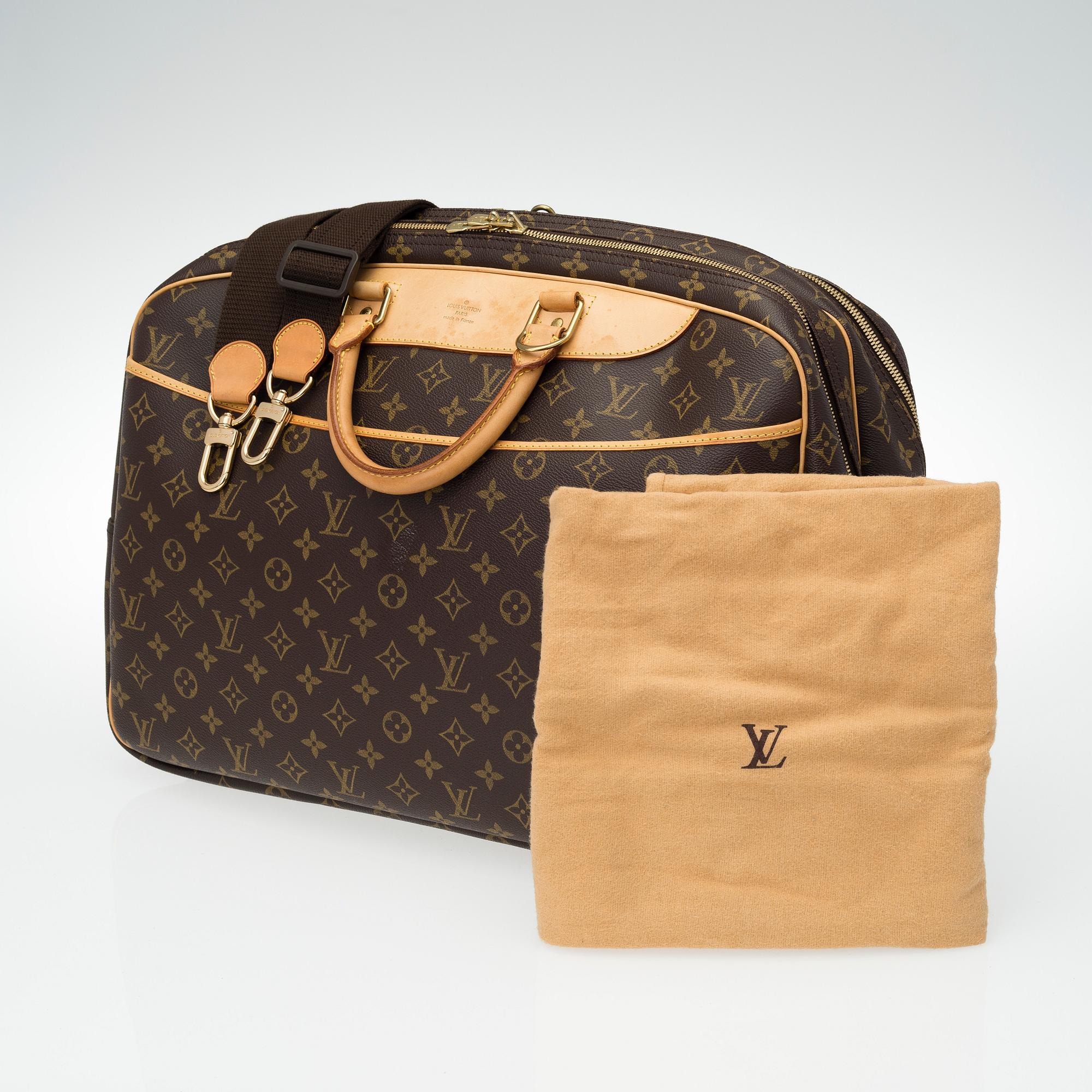 A Louis Vuitton, "Alize 24 Heures" Monogram Canvas Travel Bag.