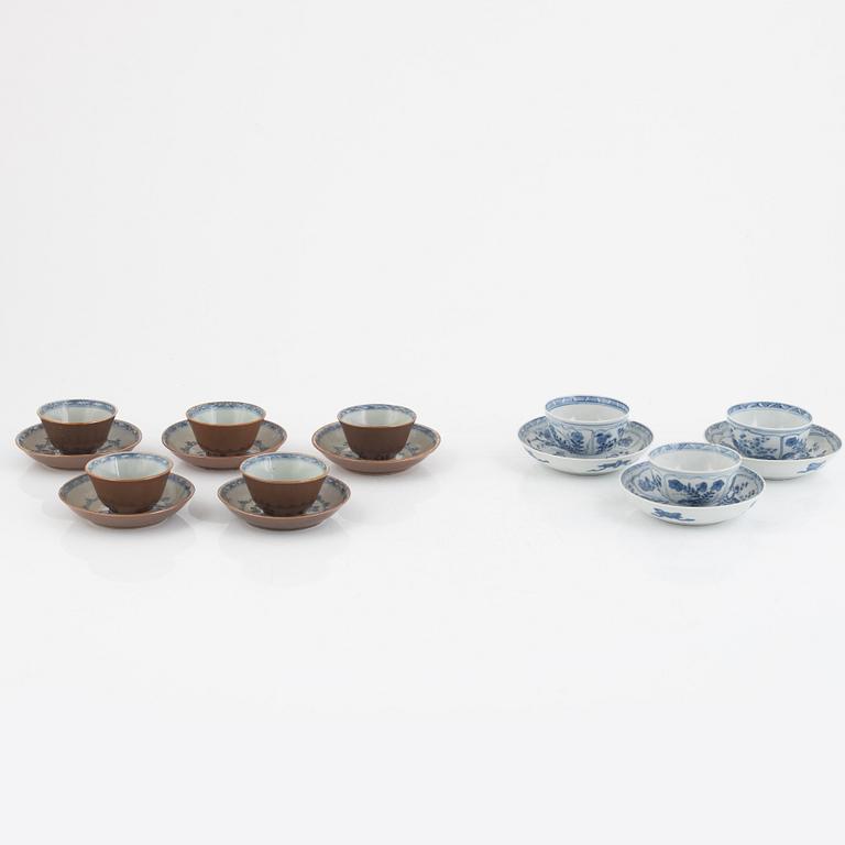 Three Kangxi cups with saucers and five Qianlong cups with saucers, China, 18th century.