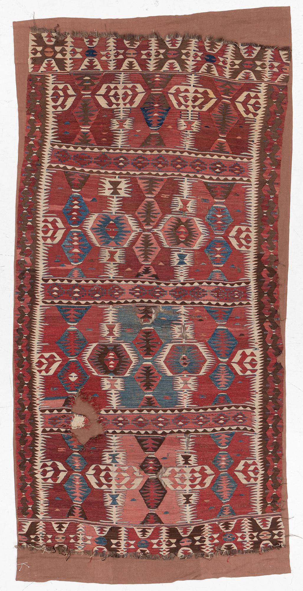 An Antique Mut kilim, central Anatolia, c. 250 x 130 cm.