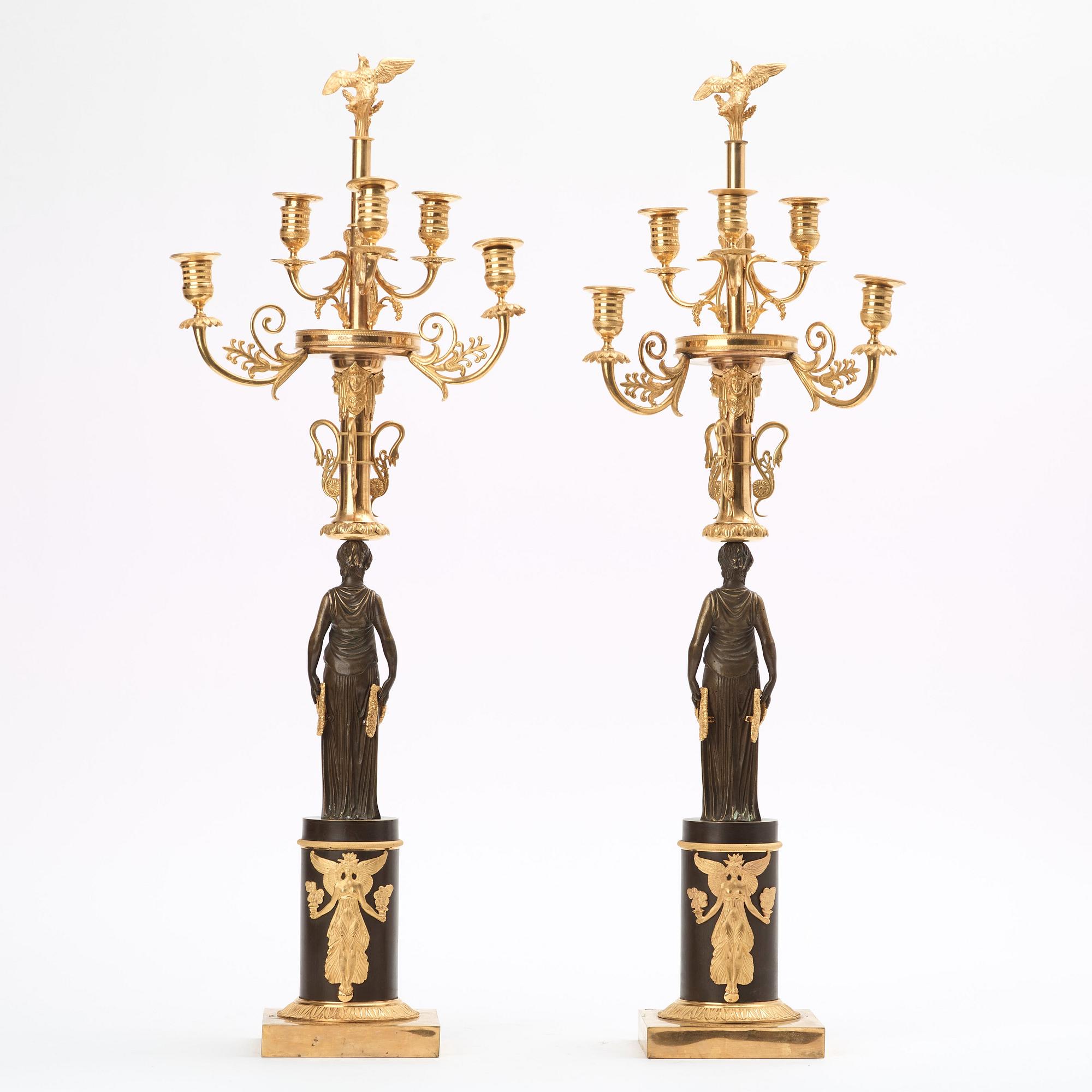 A pair of Empire early 19th century six-light candelabra.