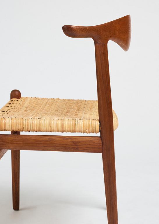 Hans J. Wegner, a teak, oak and cane "Cowhorn chair", JH 505, Johannes Hansen, Denmark 1950-60's.