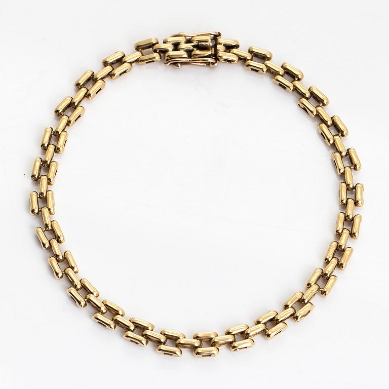 Necklace, set with a brilliant-cut diamond, and bracelet, 18K gold. Finnish import marks 1990.