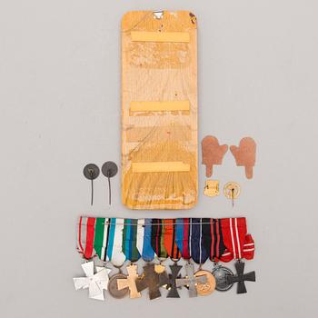 A set of Finnish badges and medals, first to second half of 20th Century.