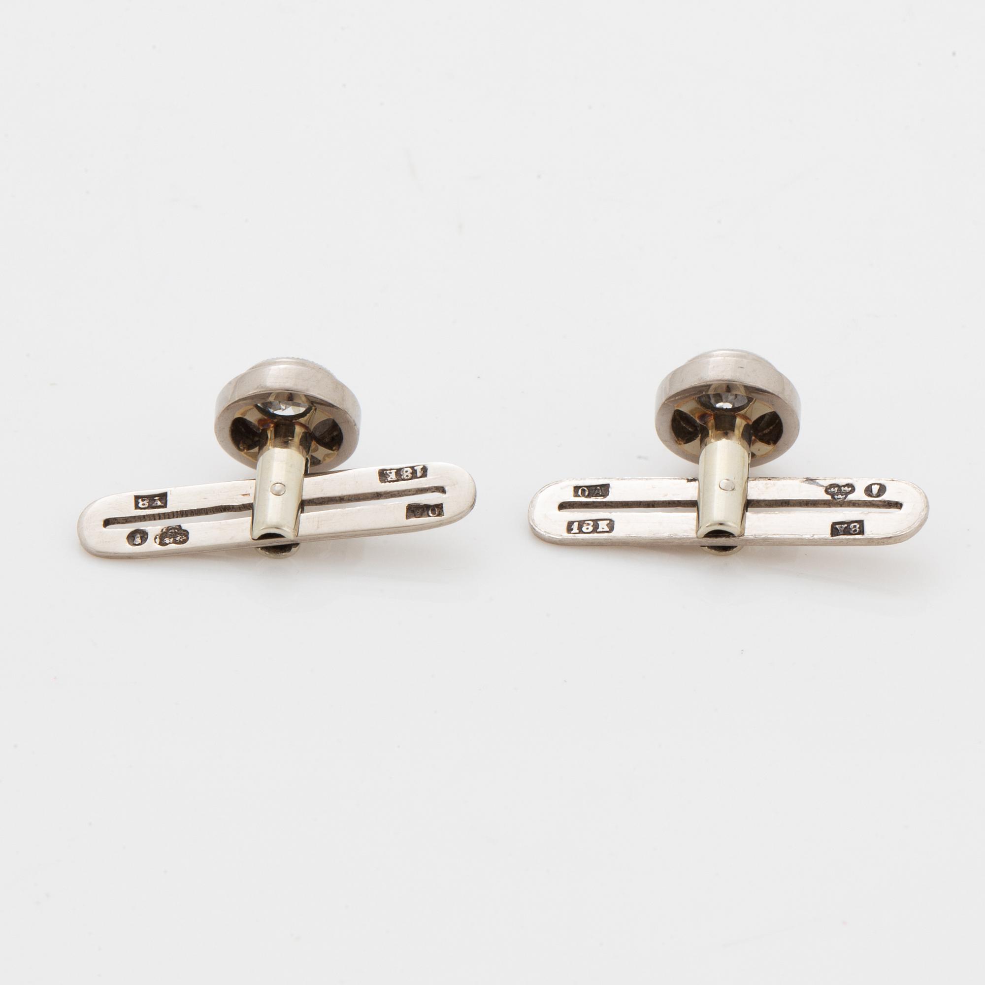 Brilliant-cut diamond shirt buttons.