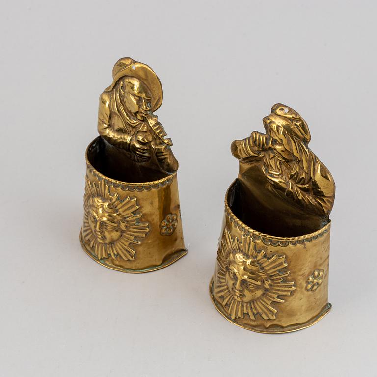 A pair of 19th century brass cutlery holders.