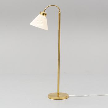 JOSEF FRANK, a model 1838 brass standard light from Svenskt Tenn.