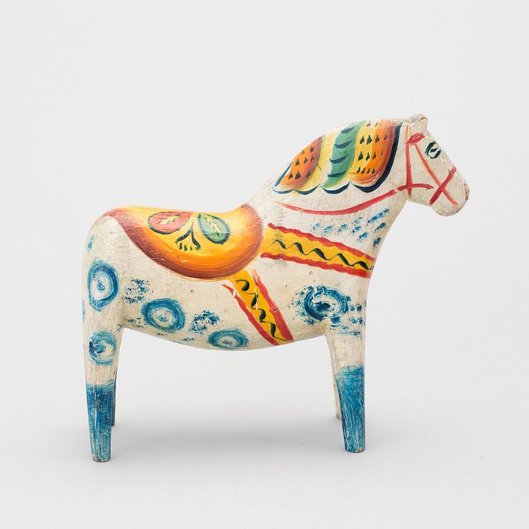 A painted folk art dala horse first half of the 20th century.