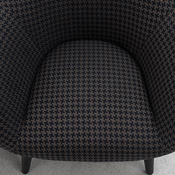 Marcel Wanders, a pair of 'Mad' srmchairs, Poliform, Italy.