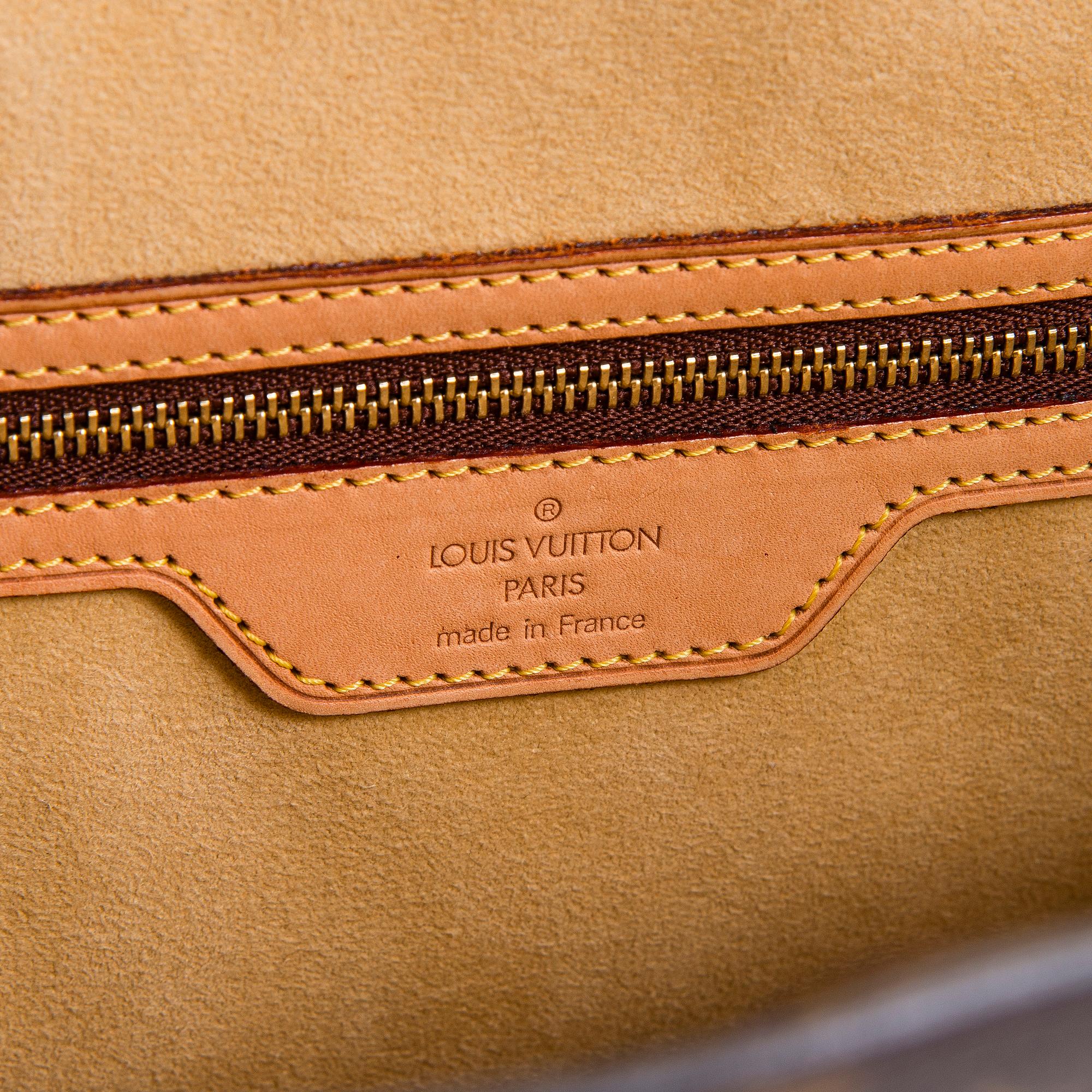 Louis Vuitton, a Monogram Canvas 'Babylone' bag.