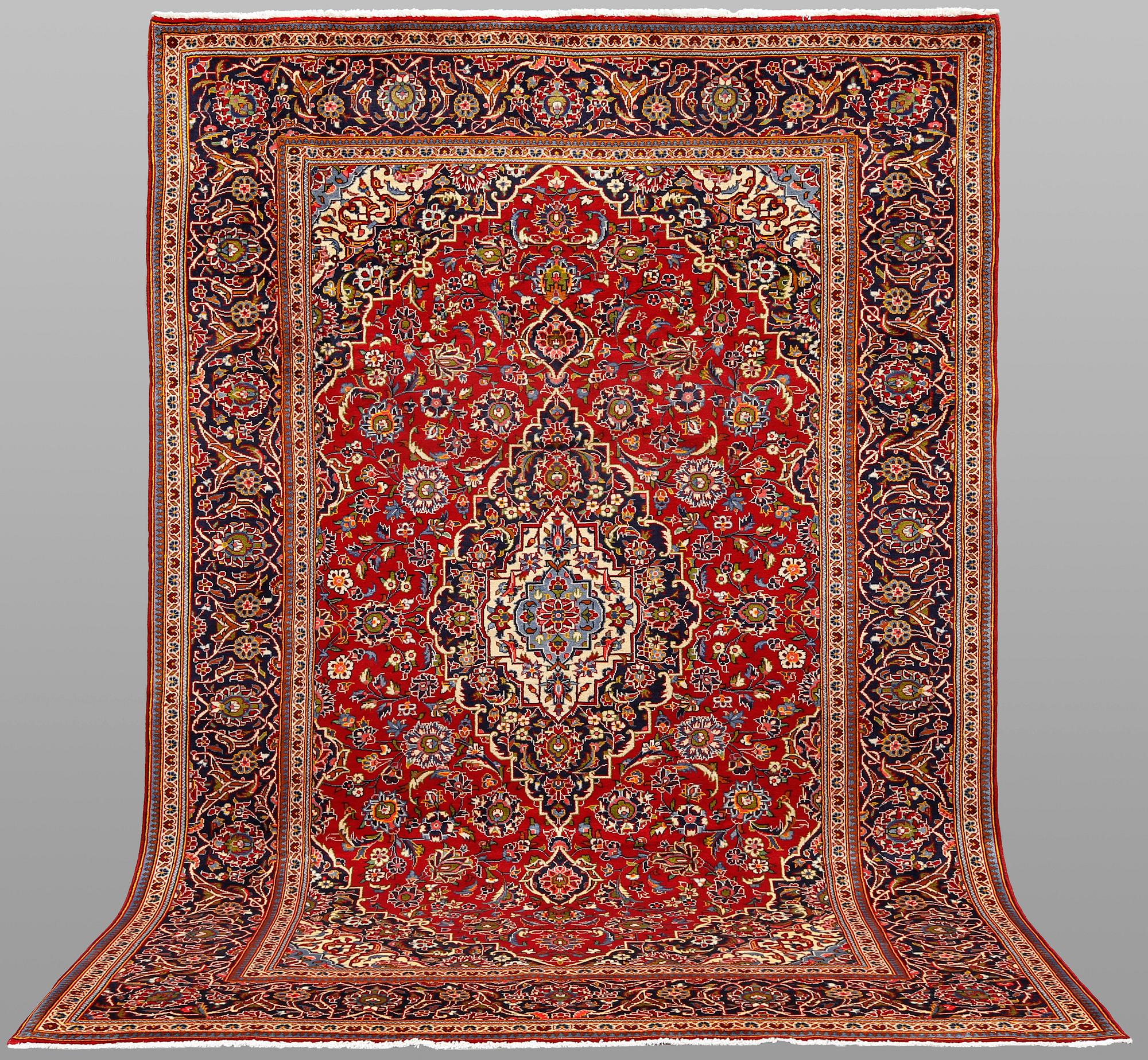 A Keshan carpet, 304 x 203 cm.
