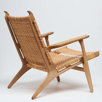 Hans J. Wegner, an oak "CH-27" easy chair, Carl Hansen & Son, Denmark, 1950-60's.