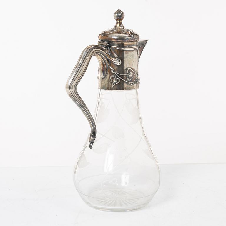 A silver and glass Art Nouveau claret jug, David Andersen, Stockholm, 1901.