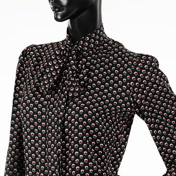 YVES SAINT LAURENT, two silk blouses.