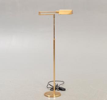 A brass floor lamp later part of the 20th century.