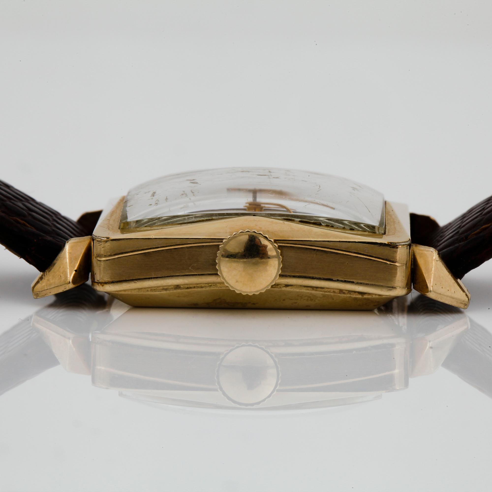 HERRARMBANDSUR, guld på stål, Girard Perregaux, Gyromatic, 1950-tal.