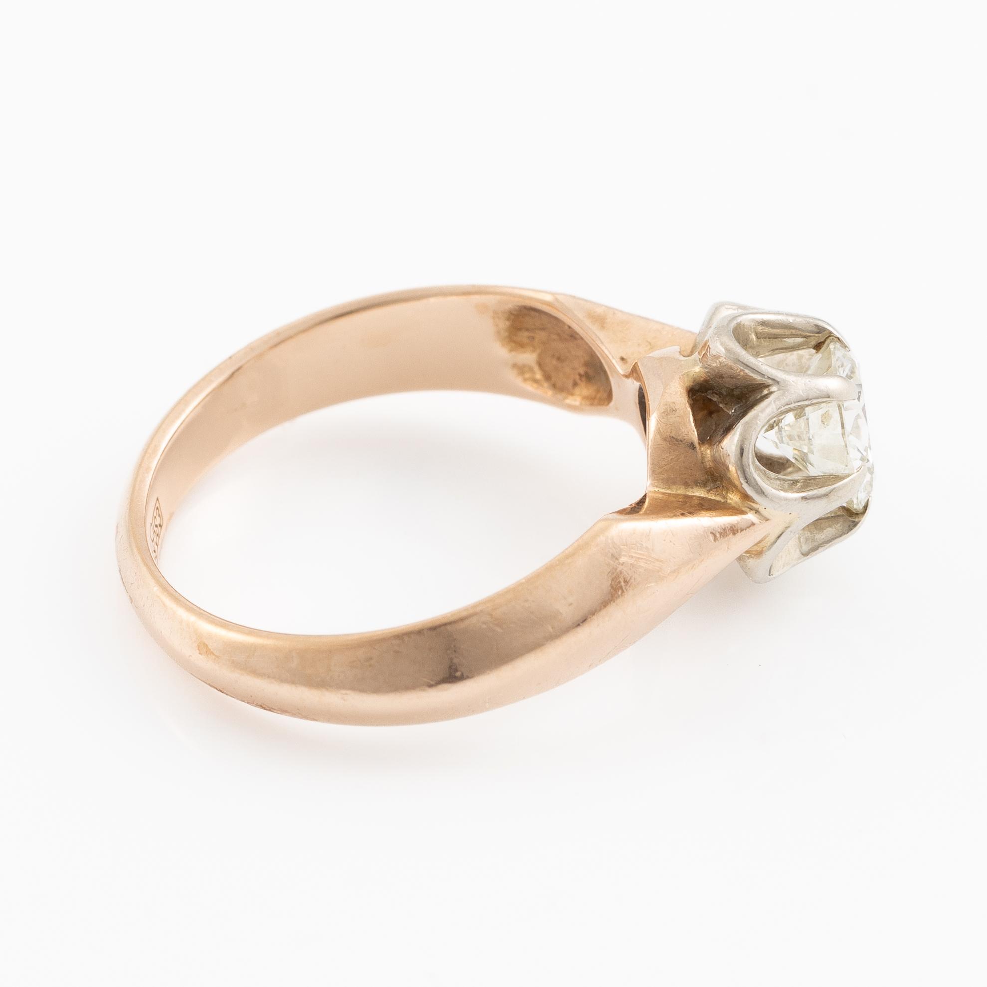 Ring, 14K guld med briljantslipad diamant.