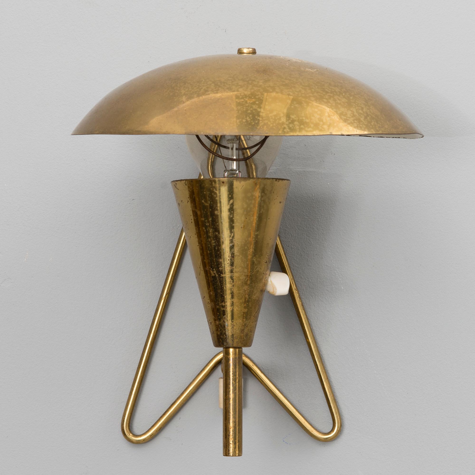 A mid-20th century wall light / table lamp, model EV 57 for Itsu, Finland.