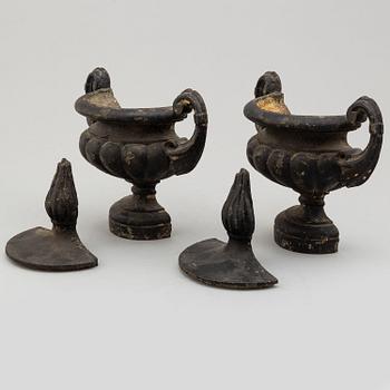 A pair of cast iron decor elements, ca 1900.