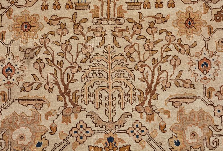 A CARPET, a semi-antique Tabriz, ca 593,5 x 398,5 cm, signed Nämatzade.