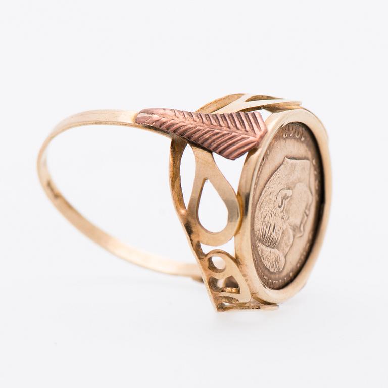 RING, 14K guldmynt, infattning och ringskena 10K guld.