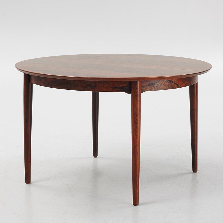 Niles Otto Møller, a rosewood veneered table with four chairs, JL Møller, Denmark, 1950's/60's.