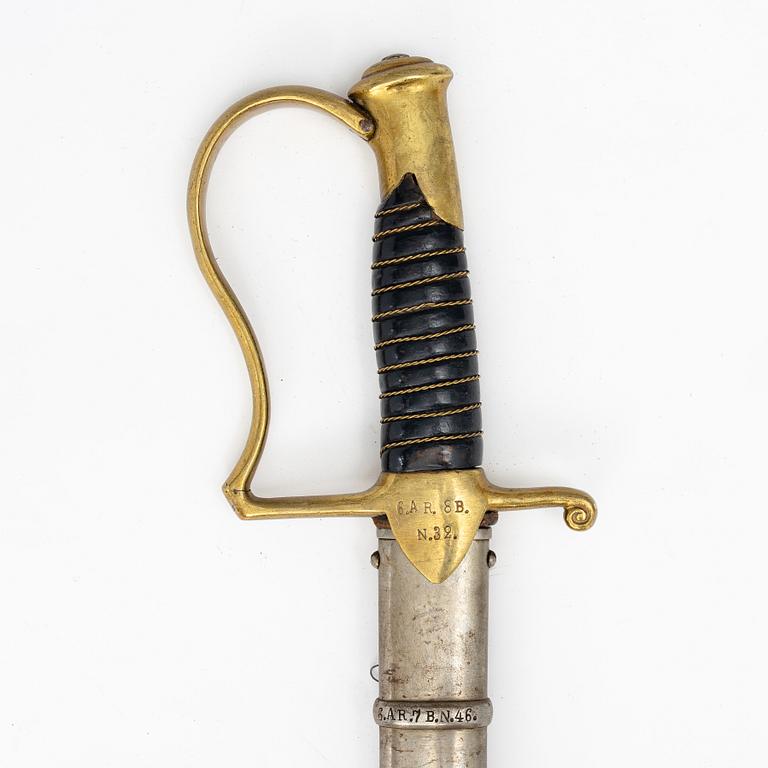 A Swedish artillery saber 1889 pattern with scabbard.
