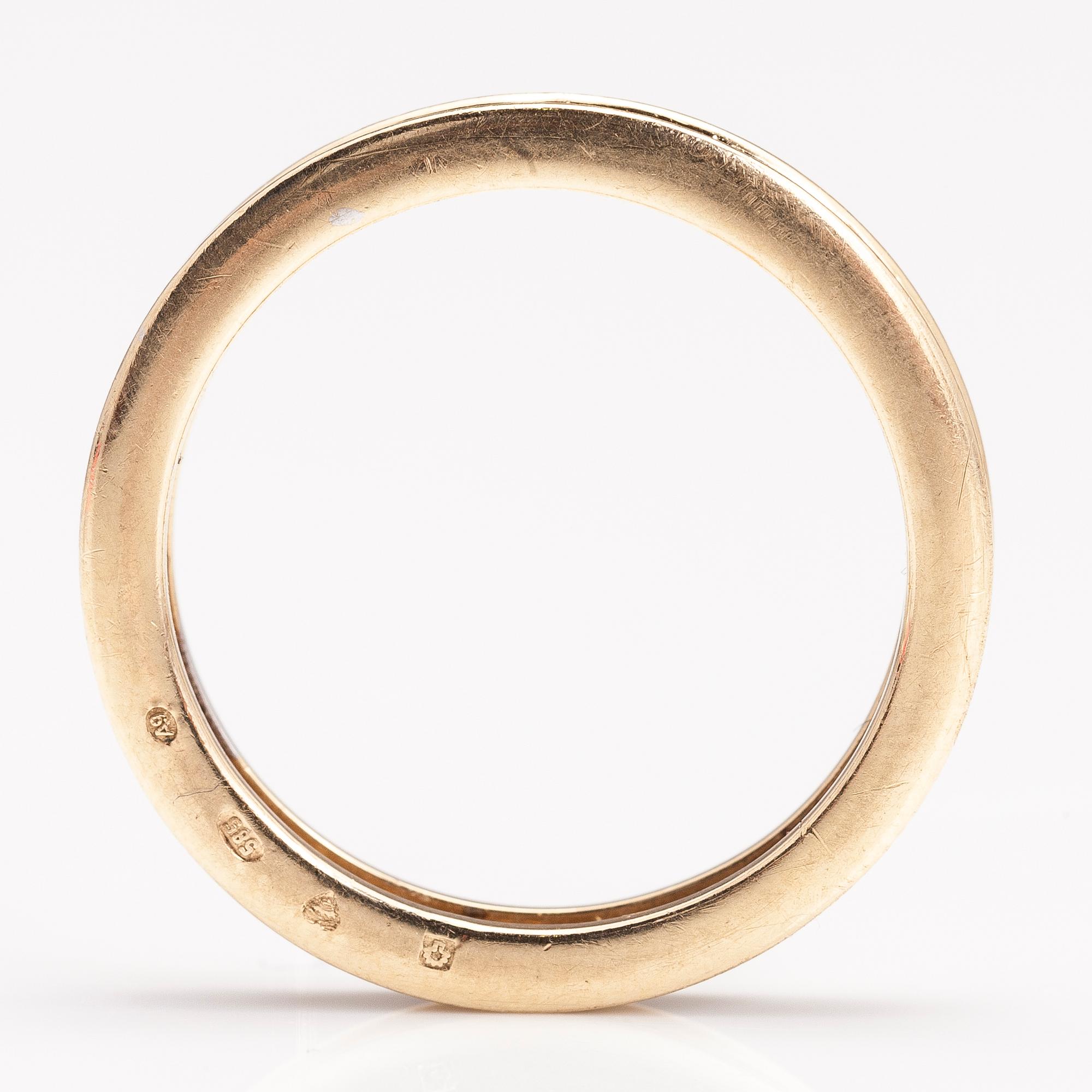A 14K gold ring with diamonds ca. 0.21 ct in total. Timantttiset, Helsinki 2002.
