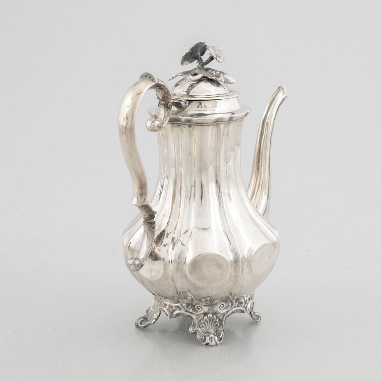 A Swedish Silver Rococo-Revival Coffee Pot, mark of Christian Hammer, Stockholm 1850.