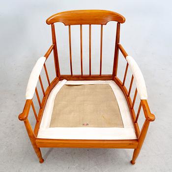Kerstin Hörlin-Holmquist, a pair of walnut armchairs 'Skrindan', mid/second half of the 20th century.