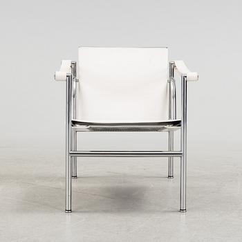 A "LC-1" ARMCHAIR DESIGNED BY LE CORBUSIER FOR CASSINA.