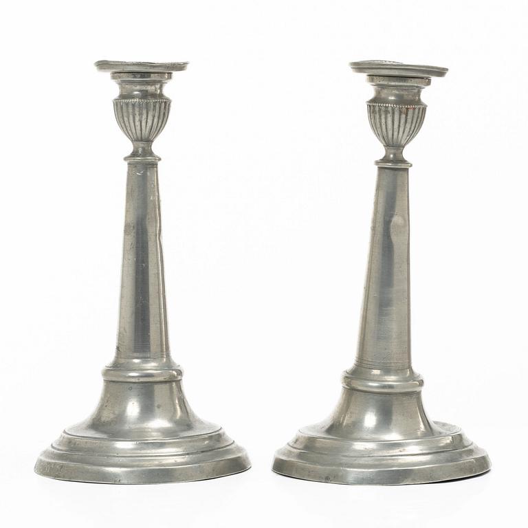 A pair of pewter candle sticks, Sweden, possibly 1844.