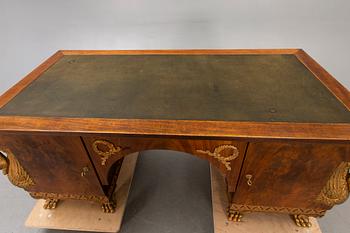 An Empire style mahogany desk 20th century.