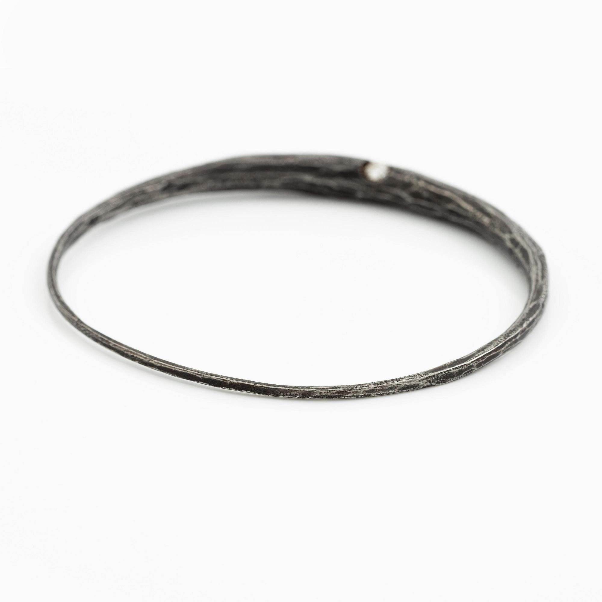 PA Lundahl-Terrs, a necklace and a bracelet, iron and round brilliant-cut diamonds.