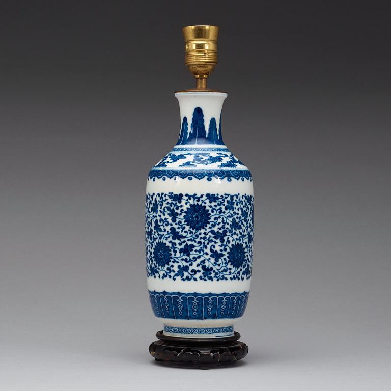 A blue and white vase decorated with lotus-scrolls and bats among clouds, Qing Dynasty, 19th Century.