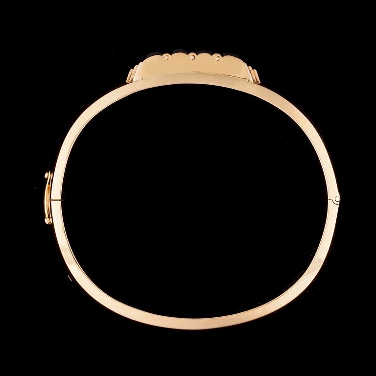 ARMBAND, 14K guld, rökkvarts. Petterson, Åbo 1963. Vikt ca 49 g.