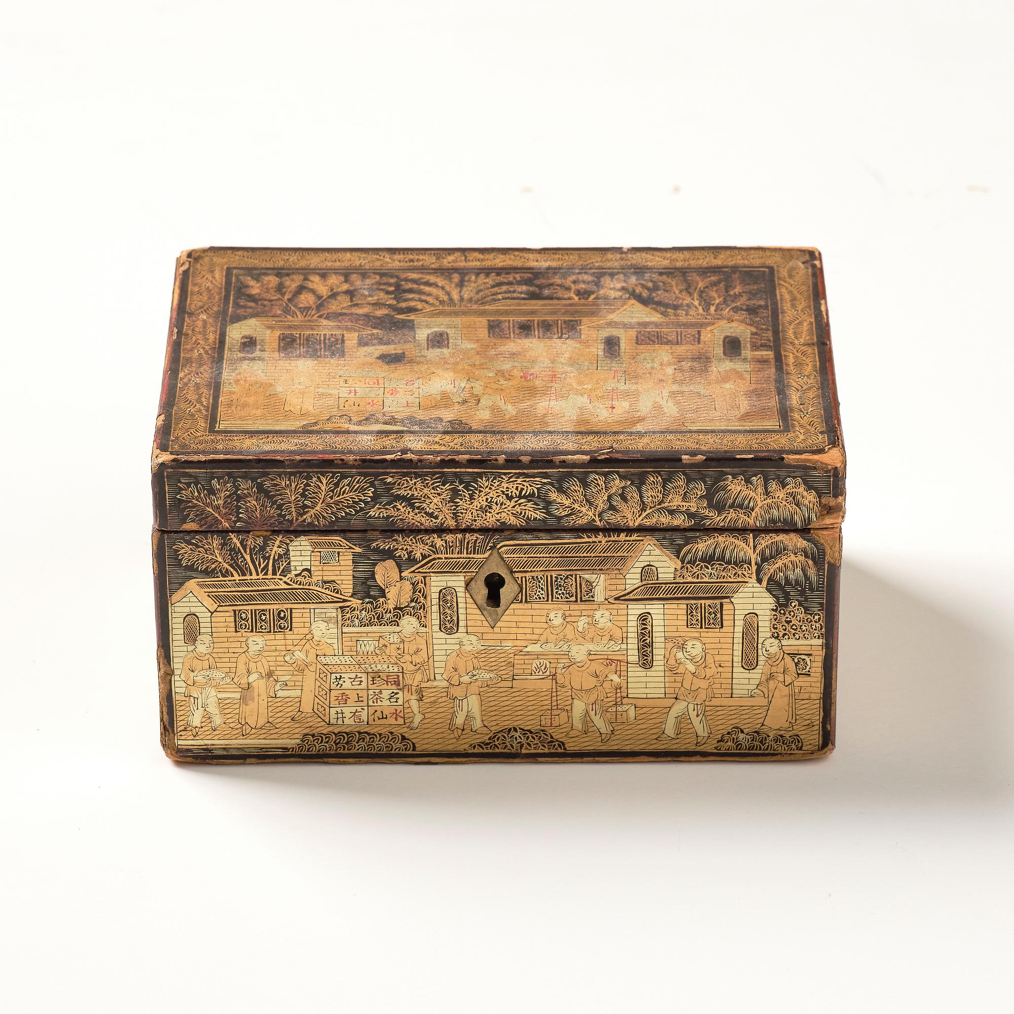 A lacquer tea box and a blanc de chine cup, Qing dynasty 18/19th century.