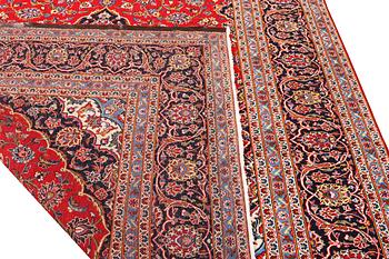 A Keshan carpet, c. 330 x 245 cm.