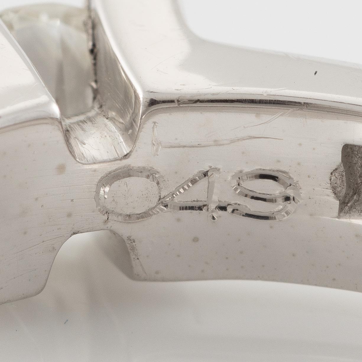 Ring in 18K white gold set with a brilliant-cut diamond weighing 0.49 ct according to the engraving.