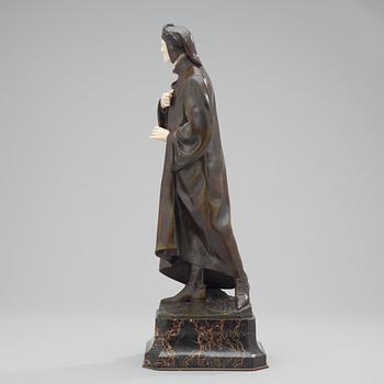 An Eduardo Rossi patinated bronze figure of Dante, mounted on a marble base, Paris.