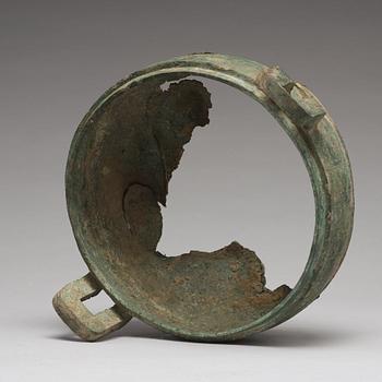 A bronze tripod food vessel and cover, "Ding", Eastern Zhou Dynasty.