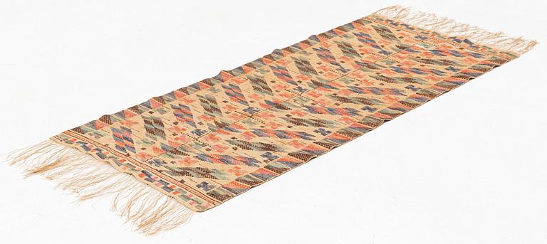 Märta Måås-Fjetterström, a textile, 'Blomkvist', flat weave, approximately 144 x 67 cm, signed MMF.