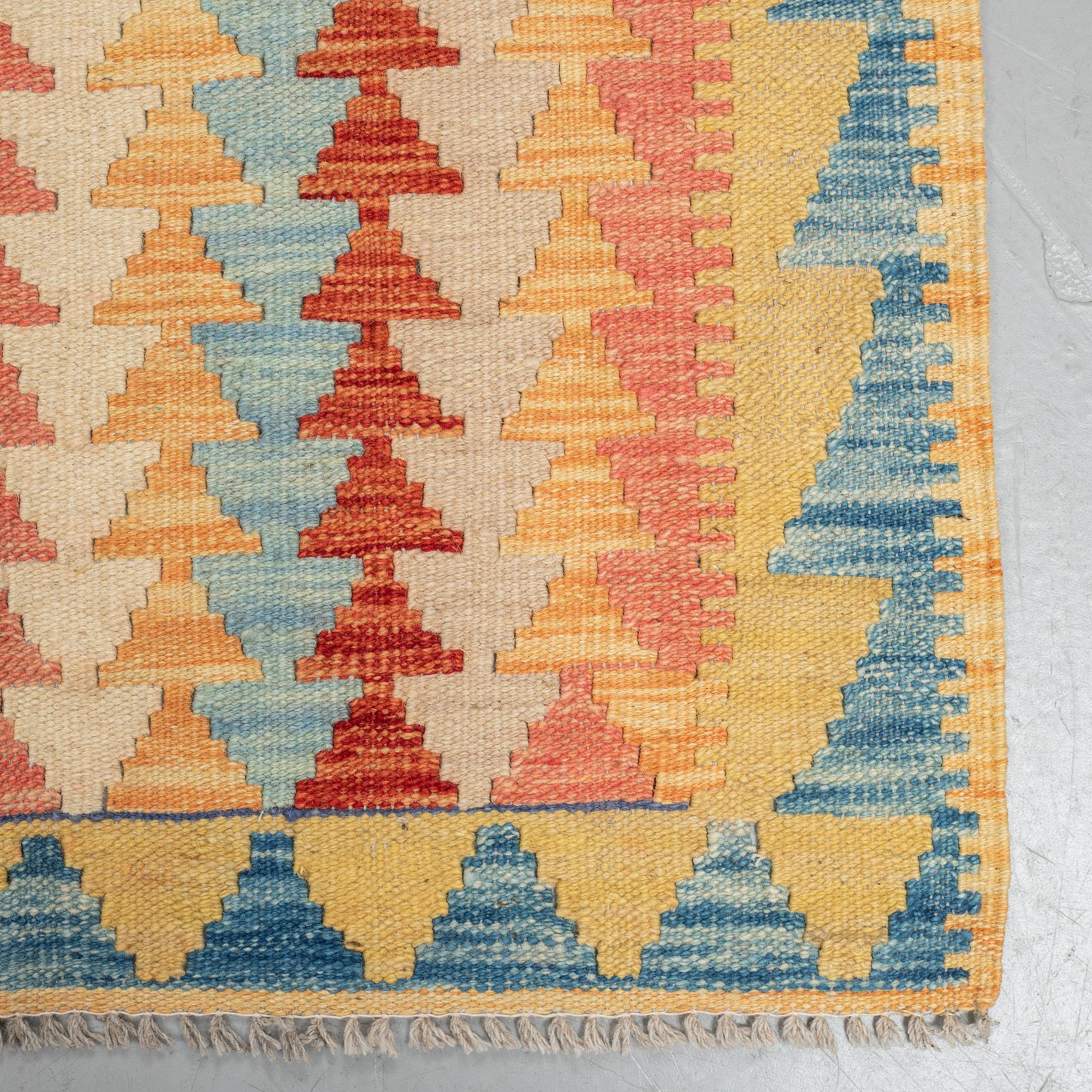 A rug, kilim, ca 247 x 171 cm.