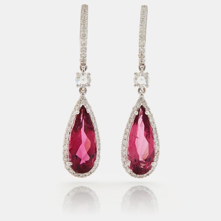 A pair of rubelite and brilliant cut diamond earrings.