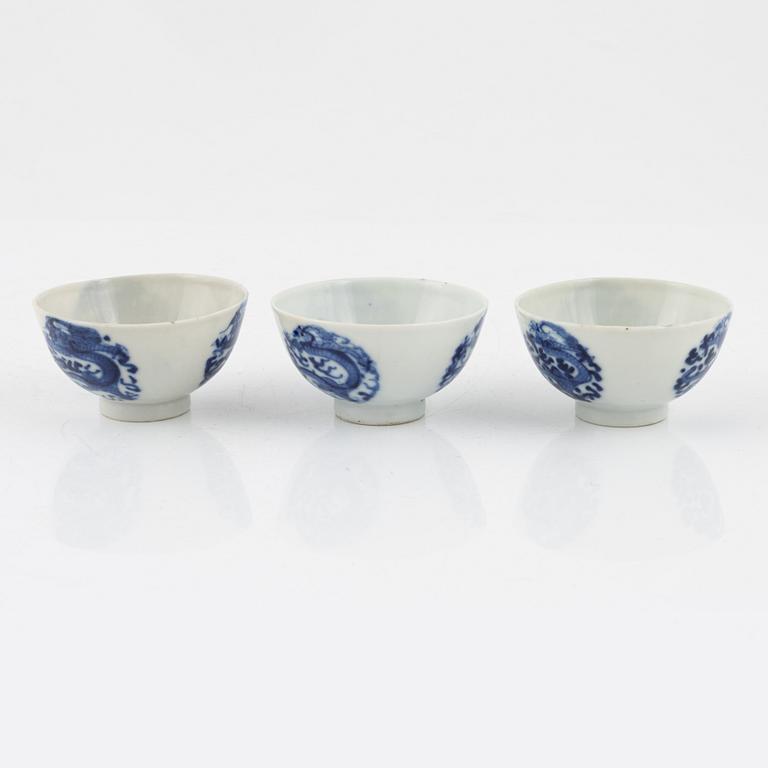 Six blue and white porcelain spoons and three cups, China, late Qing dynasty.